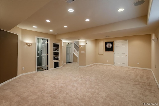 basement with light colored carpet