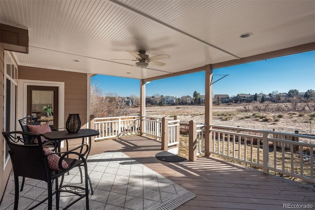 wooden terrace with ceiling fan