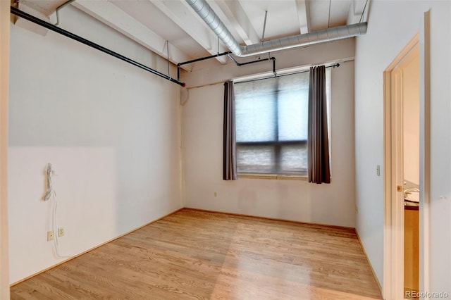 empty room featuring wood finished floors