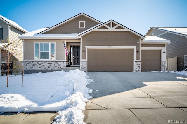 craftsman-style home featuring a garage