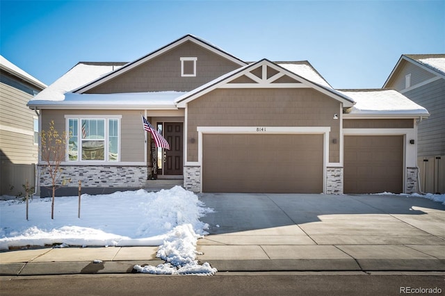 craftsman-style home with a garage