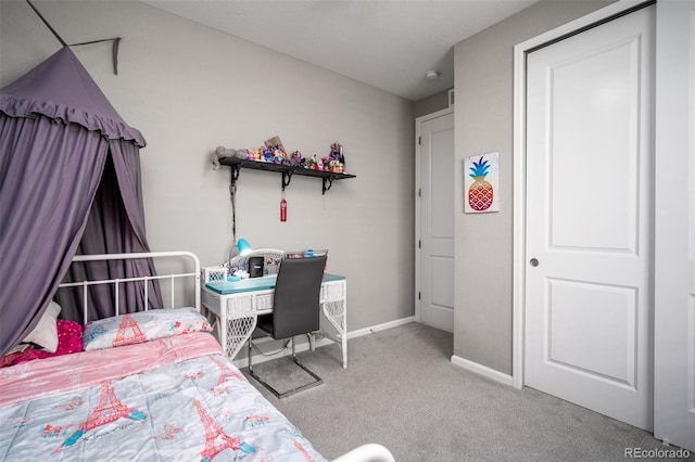 bedroom featuring light colored carpet