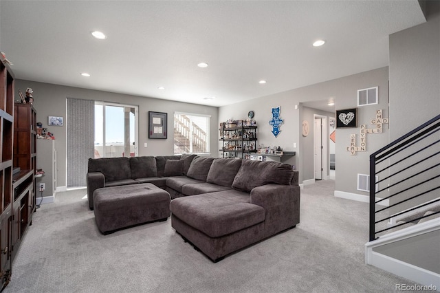 living room featuring light colored carpet