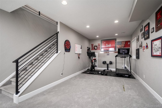 exercise area featuring carpet flooring