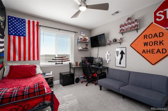 carpeted bedroom with ceiling fan