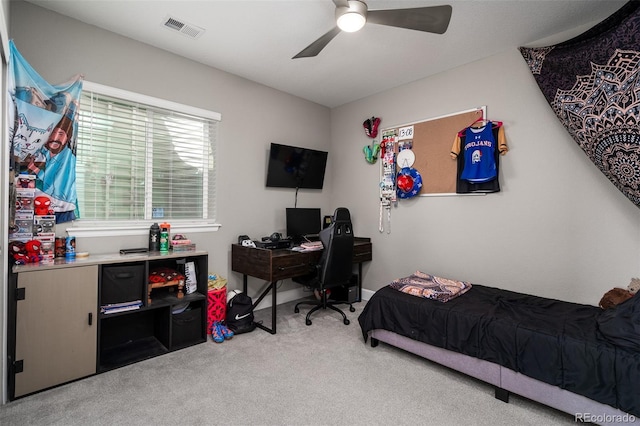 carpeted bedroom with ceiling fan