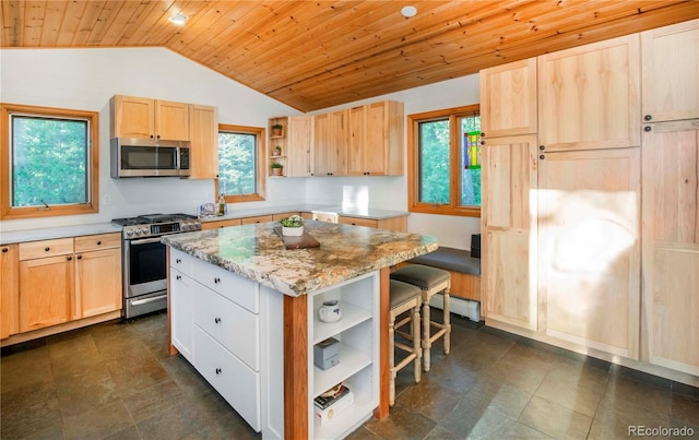 13416 Kuehster Rd, Littleton, CO 80127 - kitchen with open shelves, appliances with stainless steel finishes, lofted ceiling, wooden ceiling, and light brown cabinetry