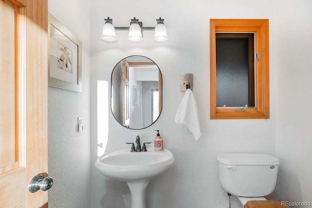 13416 Kuehster Rd, Littleton, CO 80127 - bathroom with toilet and a sink