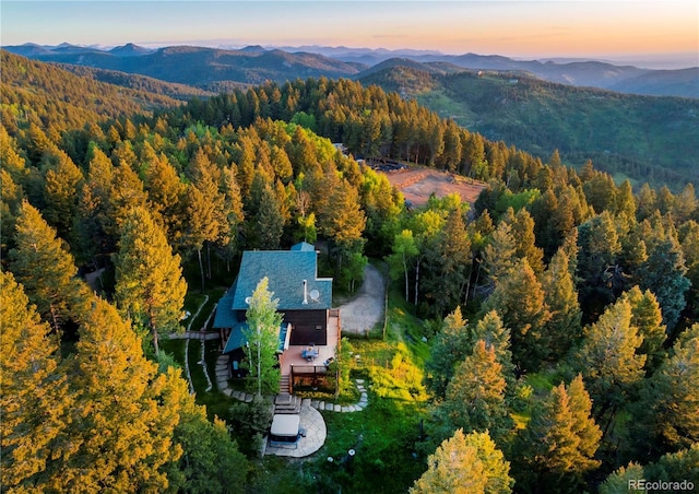 13416 Kuehster Rd, Littleton, CO 80127 - aerial view at dusk of a view of trees and a mountain view