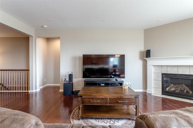 6265 S Ider Way, Aurora, CO 80016 - living room with wood-type flooring, a fireplace, and baseboards