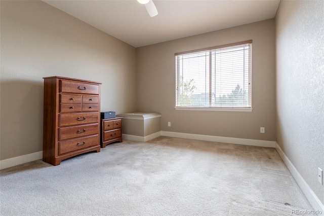 6265 S Ider Way, Aurora, CO 80016 - spare room featuring light colored carpet, a ceiling fan, and baseboards