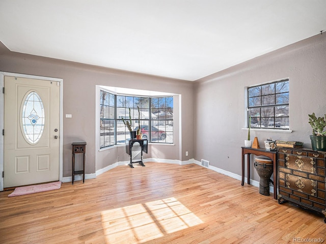 foyer entrance featuring light hardwood / wood-style floors