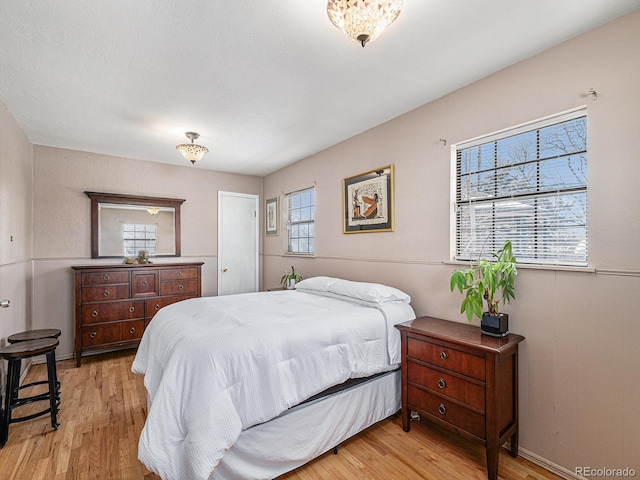 bedroom featuring light hardwood / wood-style floors