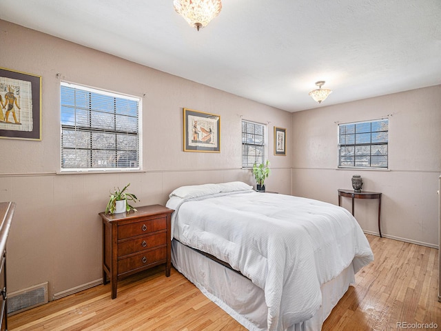 bedroom featuring light wood-type flooring