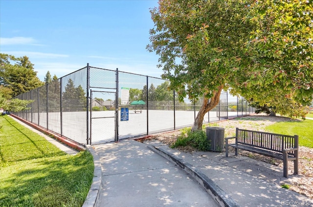 3853 S Genoa Ct Unit D, Aurora, CO 80013 - view of home's community with a gate and a tennis court