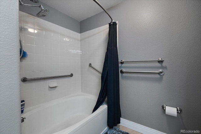 bathroom featuring shower / tub combo with curtain