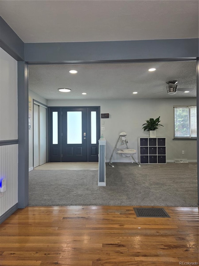 1641 Orchard Dr, Denver, CO 80221 - foyer featuring baseboards, wood finished floors, and recessed lighting