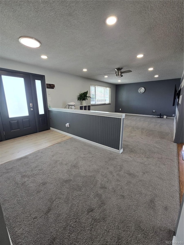 1641 Orchard Dr, Denver, CO 80221 - carpeted entrance foyer featuring a textured ceiling, ceiling fan, recessed lighting, and baseboards