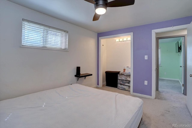 1641 Orchard Dr, Denver, CO 80221 - bedroom featuring light carpet, baseboards, and a ceiling fan
