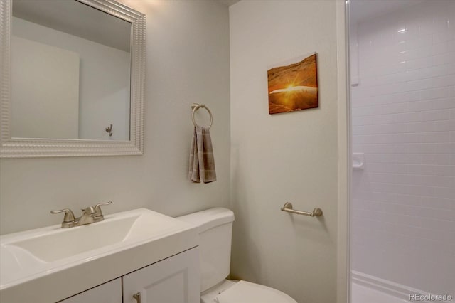 1641 Orchard Dr, Denver, CO 80221 - full bath featuring toilet, vanity, and tiled shower