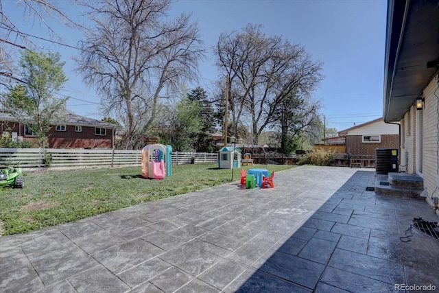 1641 Orchard Dr, Denver, CO 80221 - view of patio with central AC unit and a playground