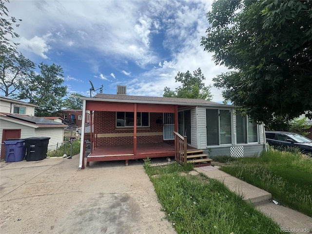 888 Wolff St, Denver, CO 80204 - view of front of house with brick siding