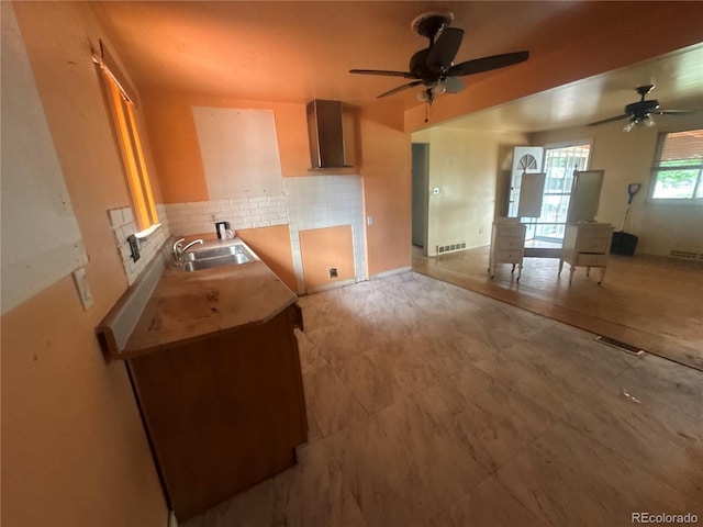 888 Wolff St, Denver, CO 80204 - kitchen with tasteful backsplash and ceiling fan