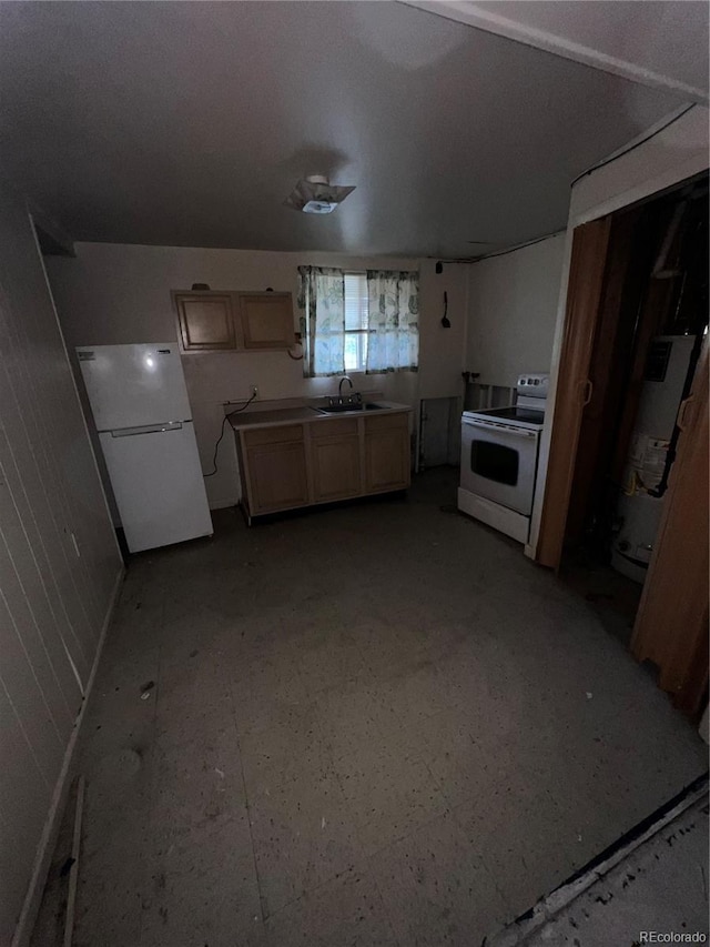 888 Wolff St, Denver, CO 80204 - kitchen with white appliances, water heater, light brown cabinetry, and light countertops
