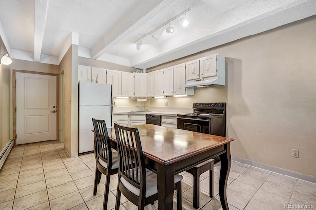 200 Granite St Unit 202, Frisco, CO 80443 - kitchen featuring black appliances, under cabinet range hood, white cabinetry, light countertops, and light tile patterned flooring