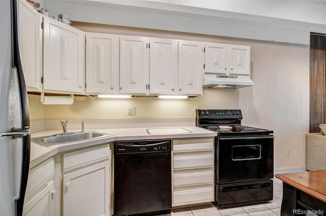 200 Granite St Unit 202, Frisco, CO 80443 - kitchen with black appliances, under cabinet range hood, light countertops, and white cabinetry