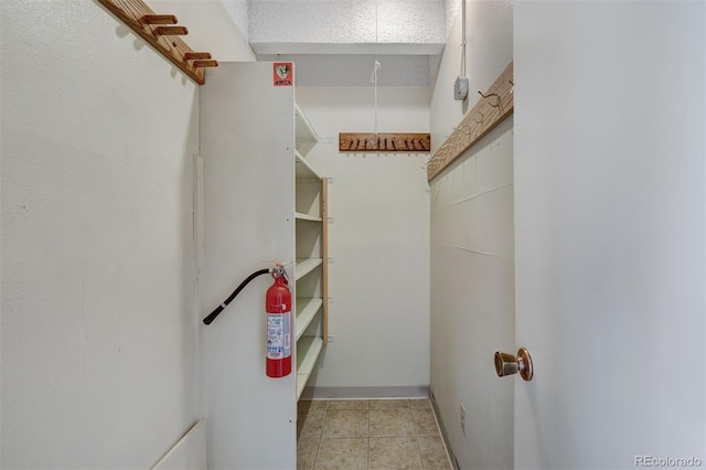 200 Granite St Unit 202, Frisco, CO 80443 - walk in closet featuring light tile patterned flooring