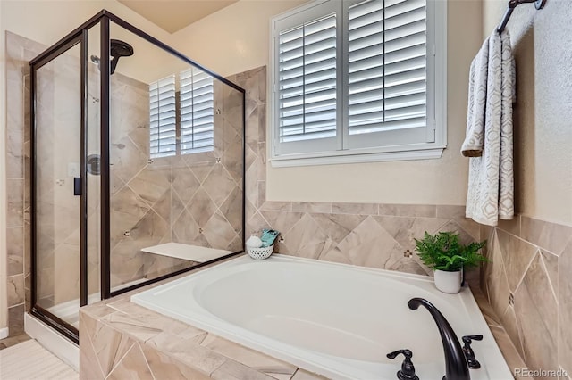 2872 Dreamcatcher Loop, Castle Rock, CO 80109 - bathroom featuring a garden tub and a shower stall