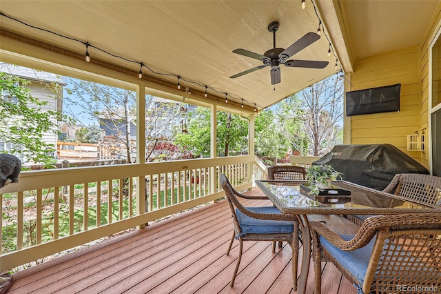 2872 Dreamcatcher Loop, Castle Rock, CO 80109 - wooden deck featuring a ceiling fan and outdoor dining area