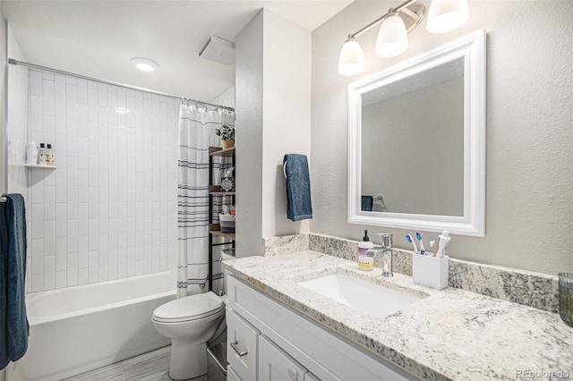 15107 E Wesley Ave, Aurora, CO 80014 - full bathroom with vanity, shower / tub combo, and toilet
