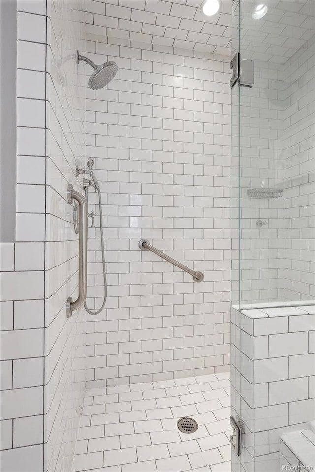 bathroom with a stall shower