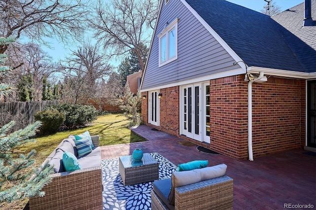 view of patio with fence and an outdoor living space