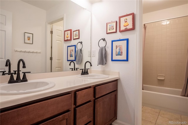 bathroom with tile patterned floors, shower / bath combo, double vanity, and a sink