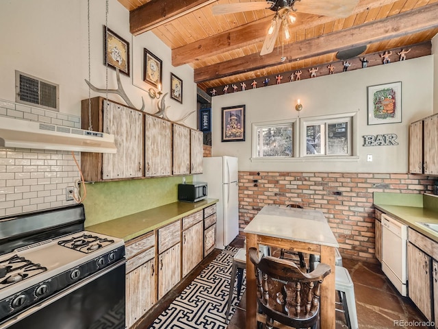 kitchen with extractor fan, wooden ceiling, beamed ceiling, brick wall, and white appliances