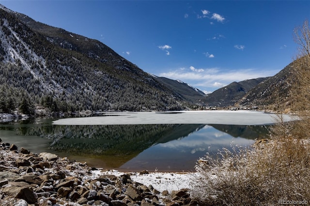 mountain view featuring a water view