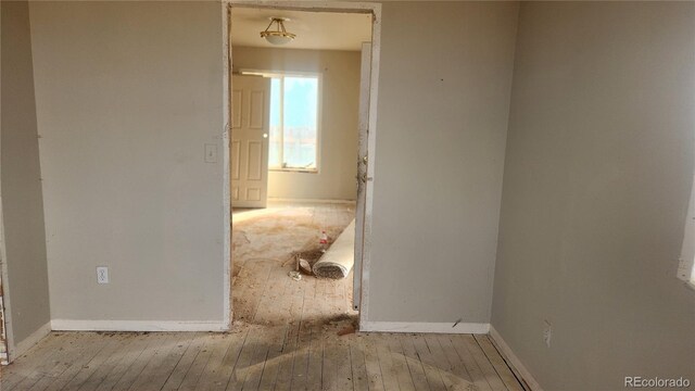 interior space with hardwood / wood-style flooring