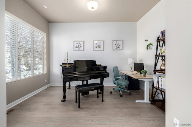 1928 W 67th Pl, Denver, CO 80221 - office space featuring light wood-type flooring and baseboards