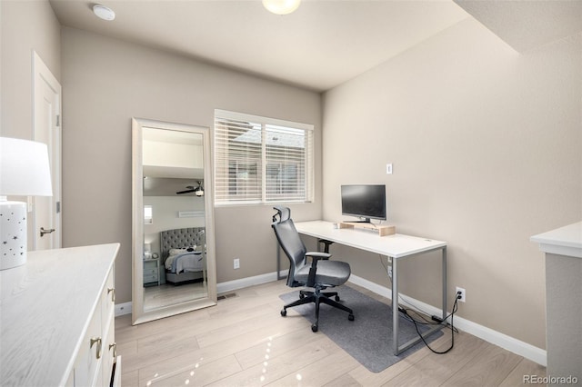 1928 W 67th Pl, Denver, CO 80221 - office area with light wood-type flooring, ceiling fan, and baseboards