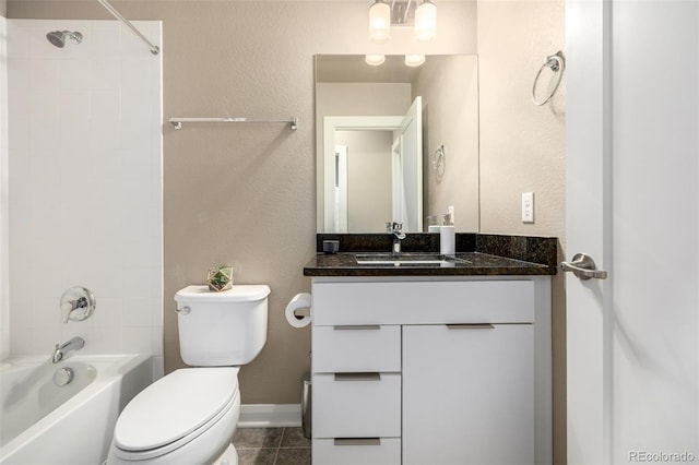 1928 W 67th Pl, Denver, CO 80221 - bathroom featuring toilet, shower / tub combination, vanity, and tile patterned flooring