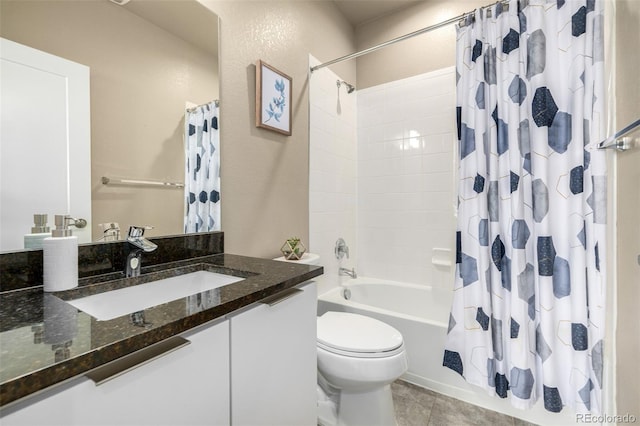 1928 W 67th Pl, Denver, CO 80221 - bathroom with toilet, tile patterned flooring, shower / bath combo, and vanity