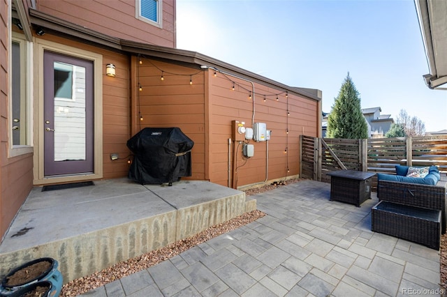 1928 W 67th Pl, Denver, CO 80221 - view of patio featuring fence, a grill, and an outdoor living space