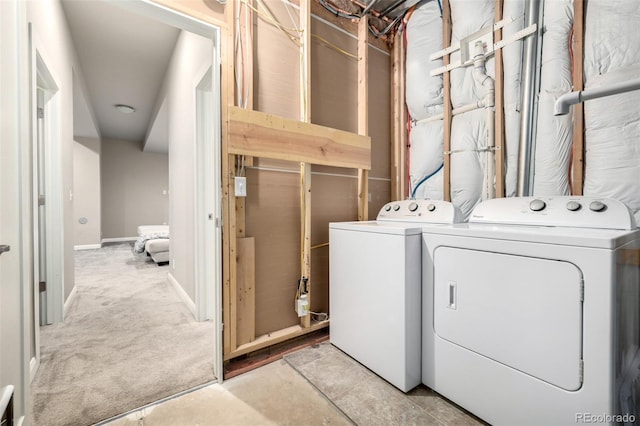 1928 W 67th Pl, Denver, CO 80221 - laundry room featuring washing machine and clothes dryer and light colored carpet