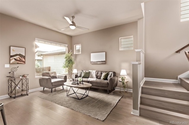 1928 W 67th Pl, Denver, CO 80221 - living room with ceiling fan, stairway, and wood finished floors
