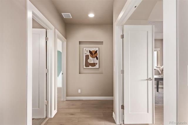 1928 W 67th Pl, Denver, CO 80221 - hallway featuring light wood-type flooring and recessed lighting