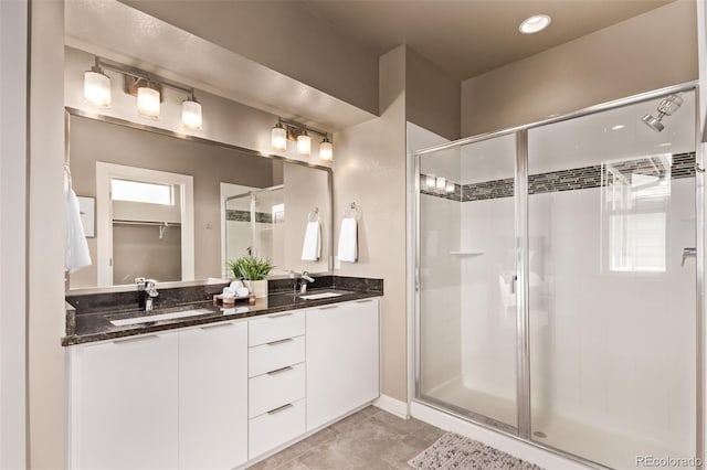 1928 W 67th Pl, Denver, CO 80221 - full bathroom featuring a stall shower and double vanity