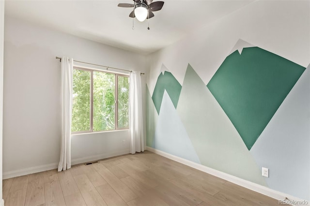 1928 W 67th Pl, Denver, CO 80221 - unfurnished room featuring a ceiling fan and wood finished floors